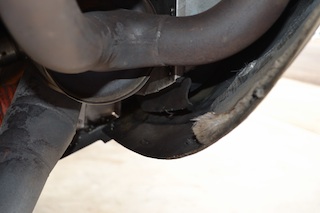 Checking the Muffler area for leaks